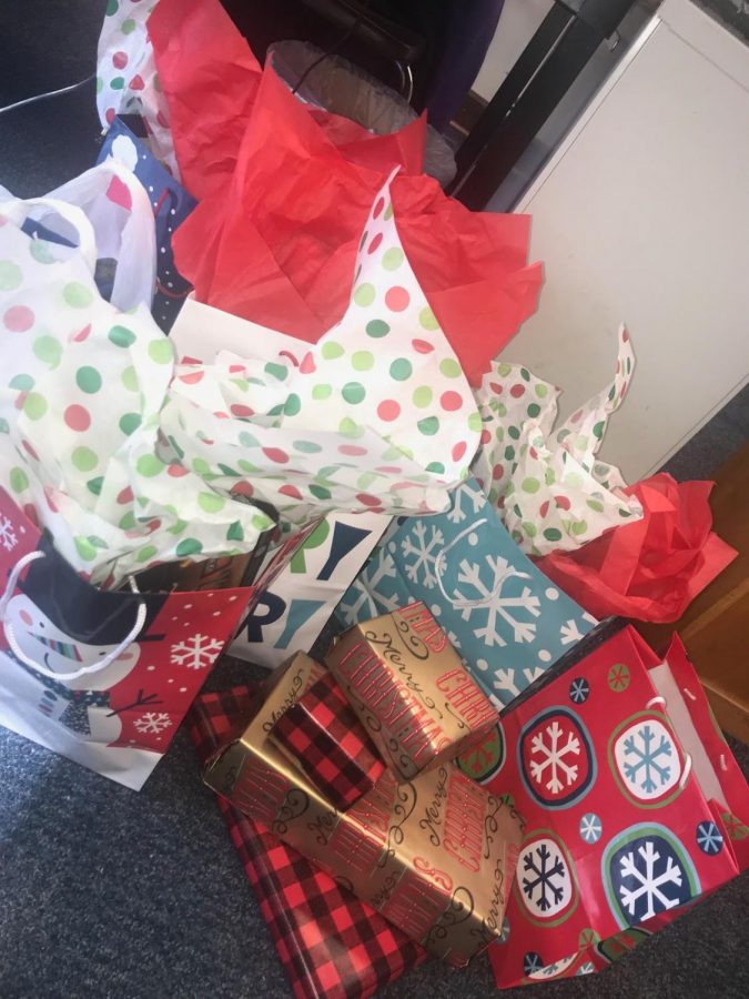 Gifts pile up at Adopt a Panther headquarters.