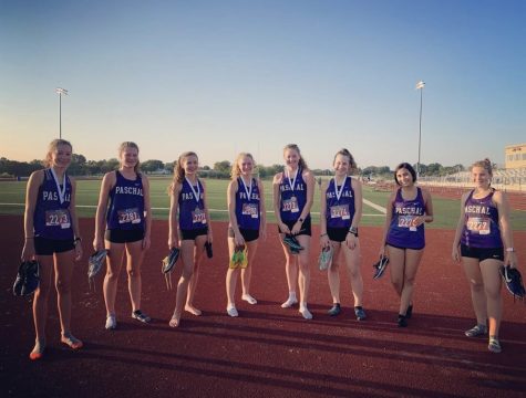 The girls varsity cross country team after their first place win at the Spartan Invitational. From left to right: Eme Barrett, Cate Schuster, Hadley Schrimpf, Anne Schuster, Ella Barrett, Anderson Berger, Brooklyn Mariscal, Lauren Hammer