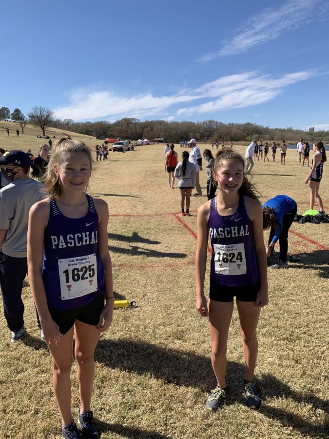 Emerson Barrett and Hadley Schrimpf on the starting line at the Region 1 Championship Meet.