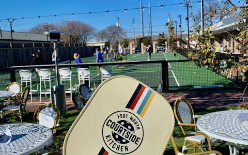 a pickle ball paddle courtesy of court side kitchen