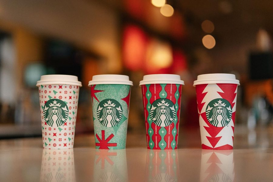 Starbucks loves bringing in the holiday spirit often starting off the season with their  many festive cups!