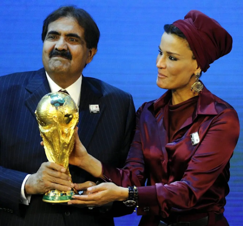 Sheikh Hamad bin Khalifa Al-Thani, Emir of Qatar  and Sheika Mozah bint Nasser al-Misned hold the World Cup trophy after winning bid
Walter Bieri/KEYSTONE, via Associated Press