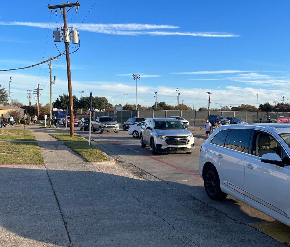 Traffic backup in front of the student parking lot prevents student drivers from quickly accessing their parking spots. (Photo taken at 8:10 AM on November 29, 2023)