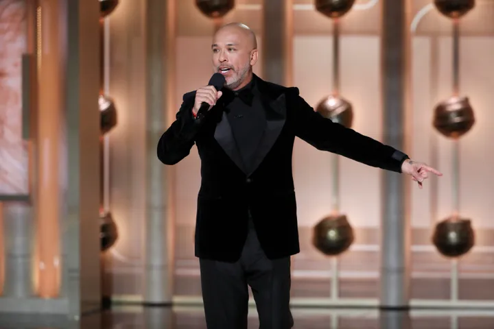 Golden+Globes+host+Jo+Koy+pictured+during+his+set+on+stage.+