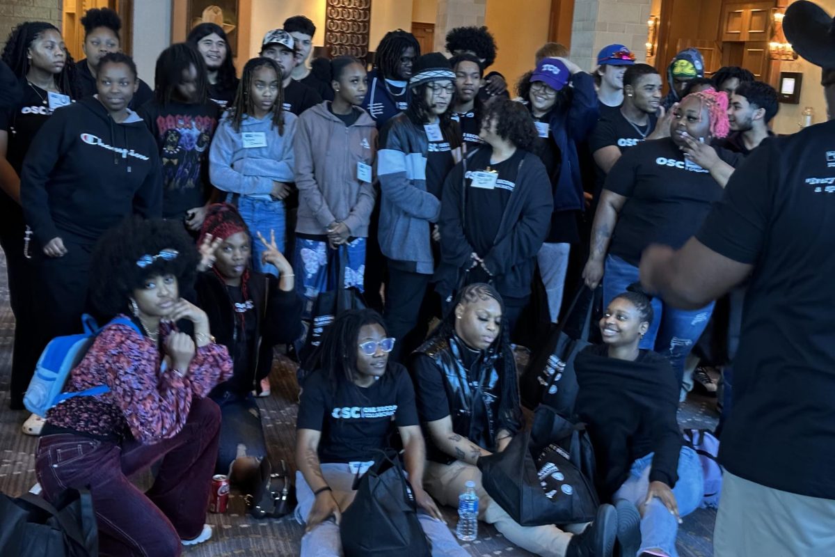 Attendees of the Tarrant County Youth Gun Violence Workgroup Summit at the Fort Worth Omni Hotel pose for a picture. 