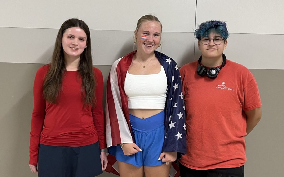 Howdy Week dress up days are thoroughly enjoyed here at Paschal. Monday's theme is "Wear Your Country's Flag." From left to right, Millicent Maddox, Annie Parsons (both representing the USA), and Andi Shipman (representing Germany).  