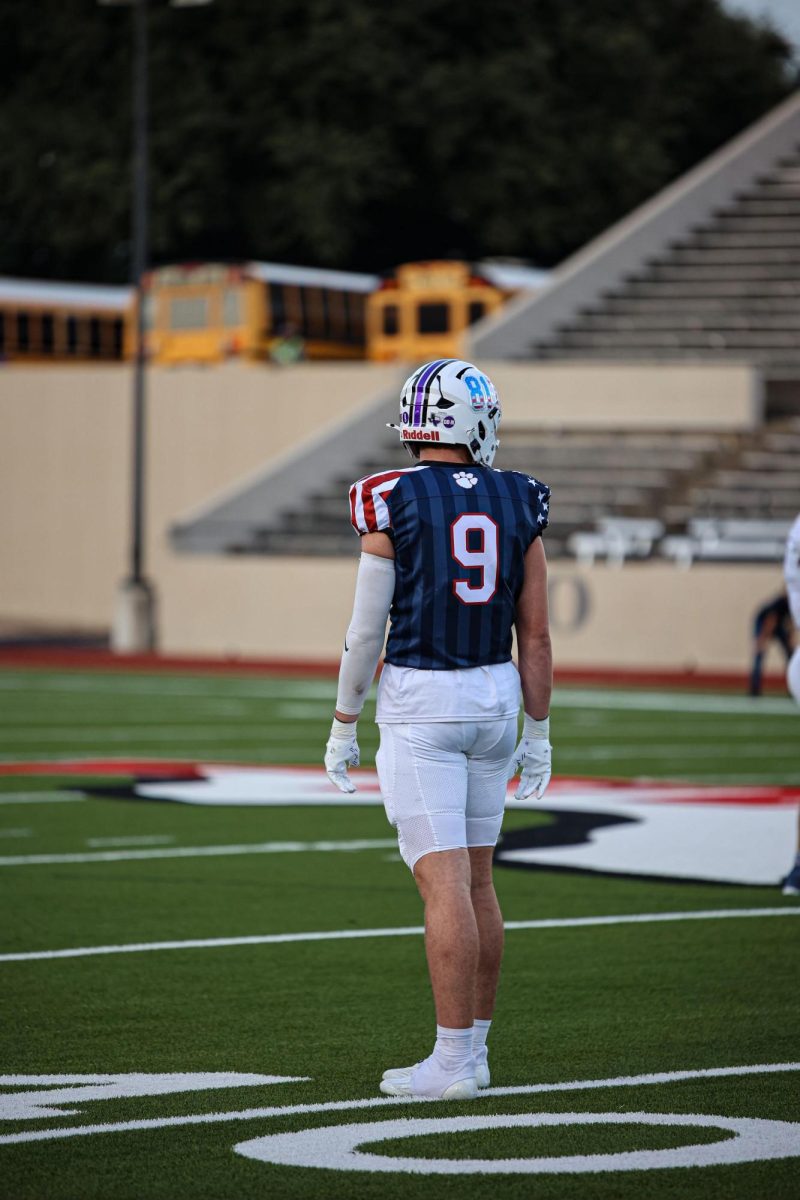 Tevis standing ready on the field at the winning game on 9/6 against Irving Nimitz.