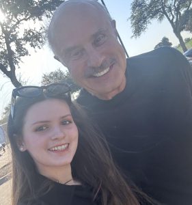 Millicent Maddox (10) poses with Dr. Phil. She and her family attended a live taping of the show on October 8th. Millicent comments, "Dr. Phil said I looked nice that day!"