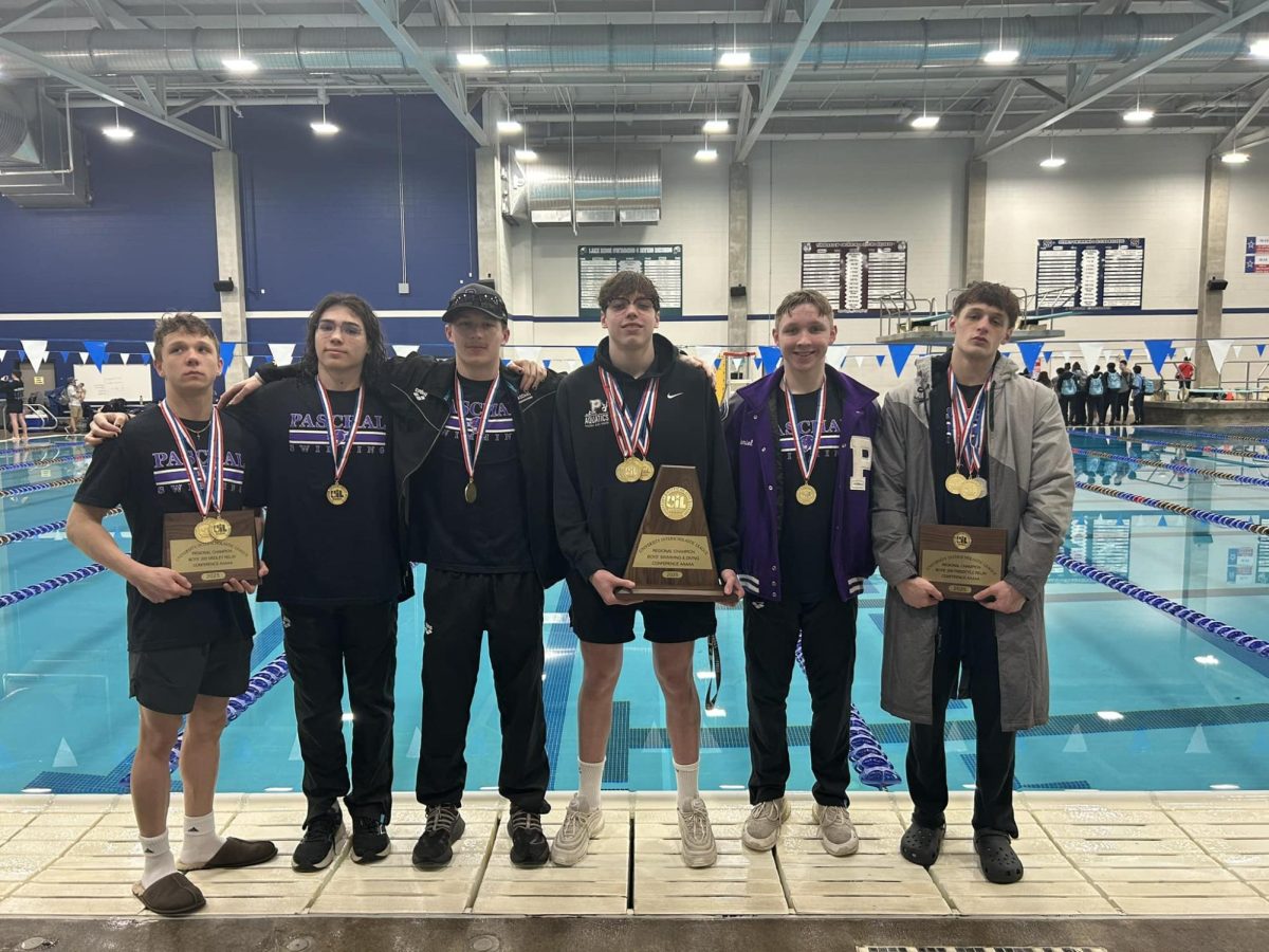 Members of the Paschal swim team (August East, Eli Rodriguez, Daniel Zimpleman, Jackson Beck, Daniel Wilke, and Harris Purcell) celebrate their amazing Regionals win. 
Photo provided by Andi Shipman