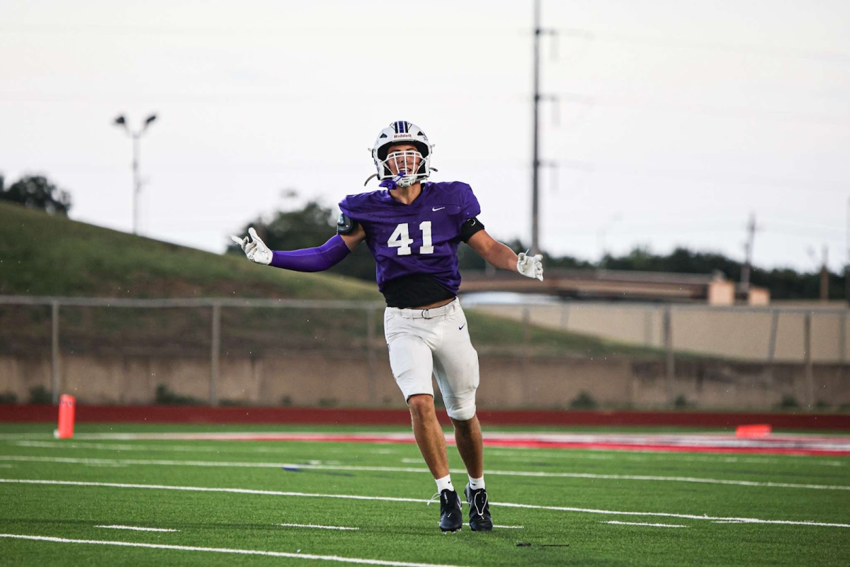 Luke Jowers (Outside Linebacker) celebrates a sack at a scrimmage game against Irving