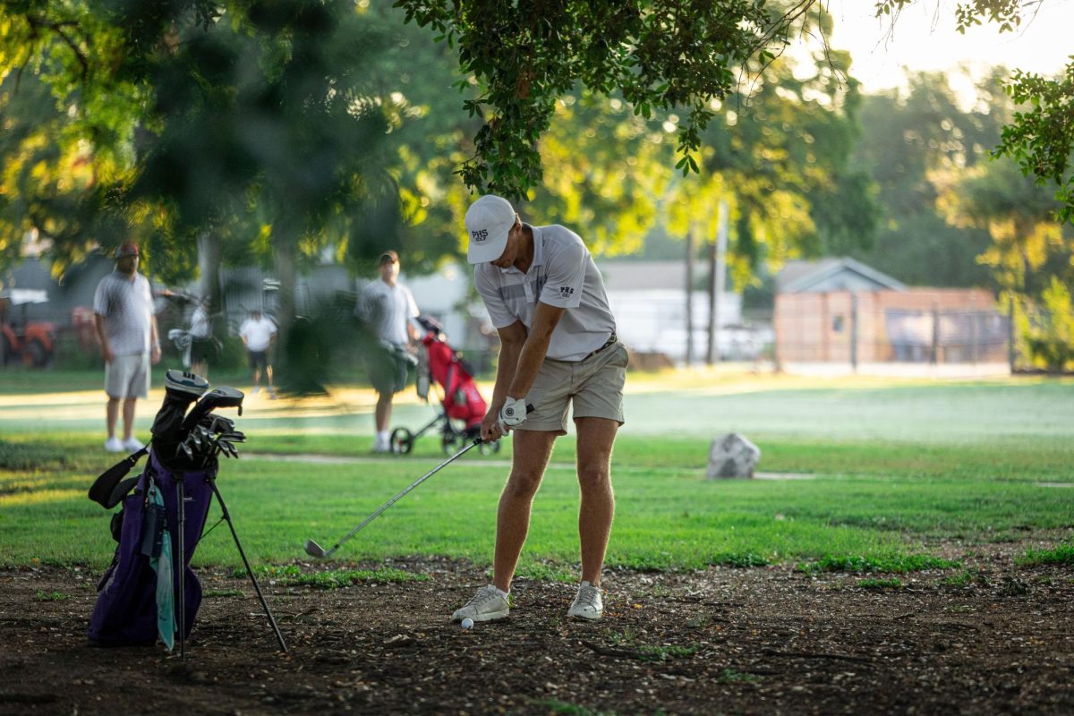 Jackson Shepard (12th) punches out to the green at the Bart Granger tournament