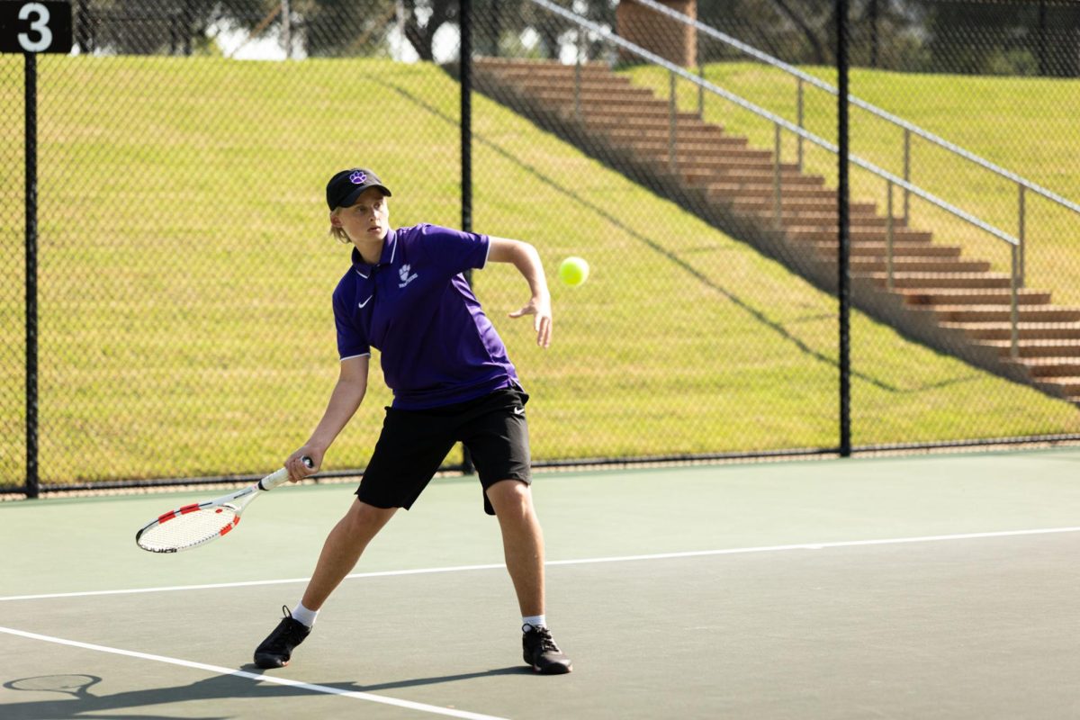 Tommy Frazier (9th) returns a serve at a recent match 