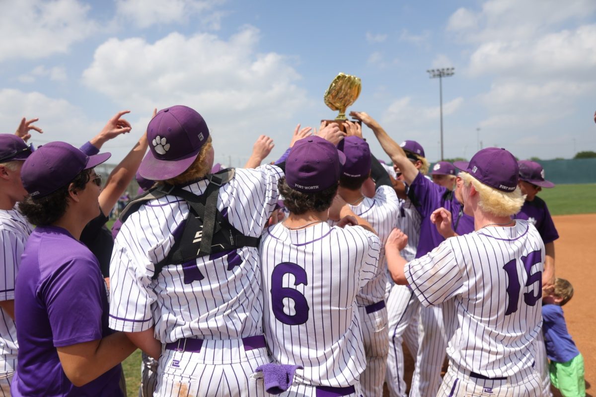 Paschal Panthers baseball team celebrates with the 2026 bi-district trophy. The Panthers take on Aledo this weekend with hopes of advancing to regional quarter finals.